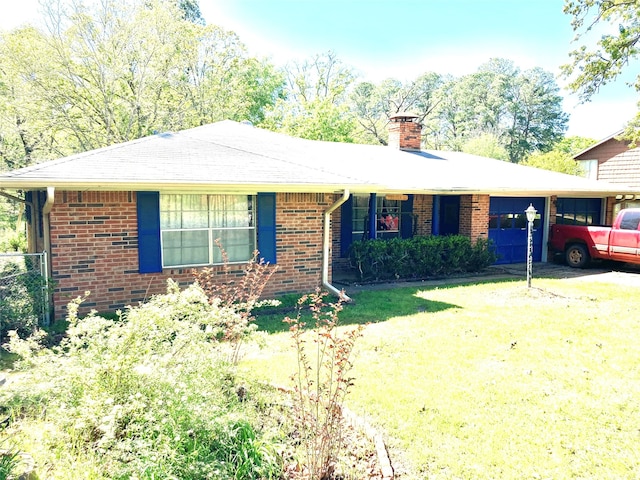 ranch-style house with a carport and a front lawn