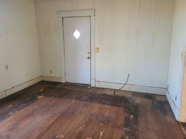 foyer with dark hardwood / wood-style flooring