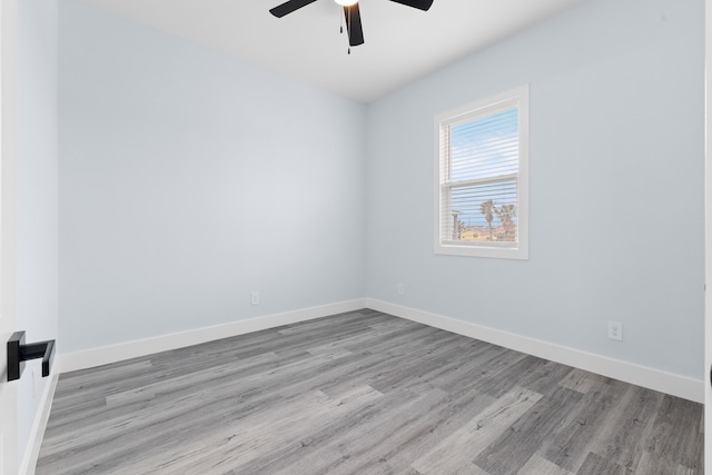 empty room featuring light hardwood / wood-style floors and ceiling fan