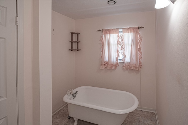 bathroom with a bath to relax in