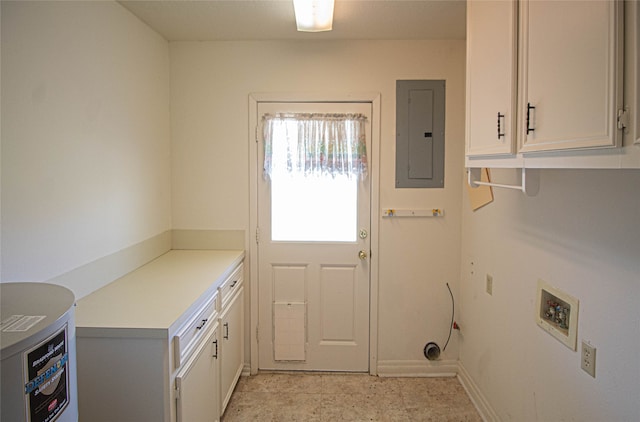 washroom featuring light tile floors, cabinets, and hookup for a washing machine