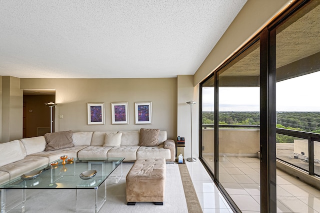 living room featuring light tile floors and a textured ceiling