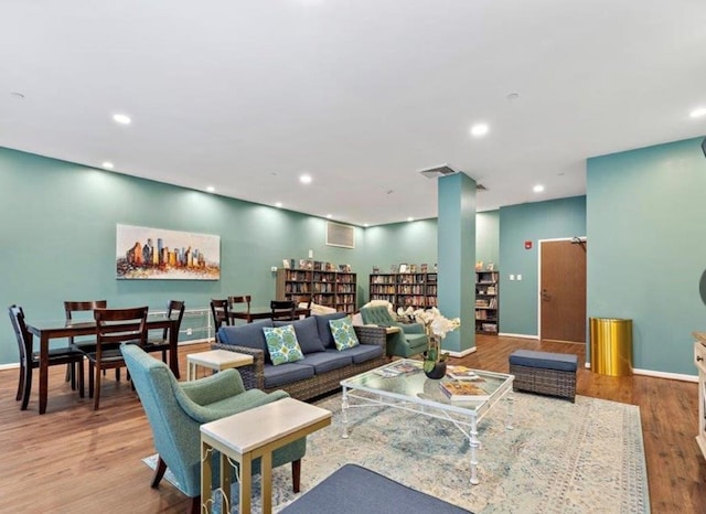 living room with wood-type flooring