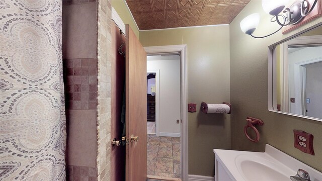 bathroom featuring vanity and tile patterned flooring