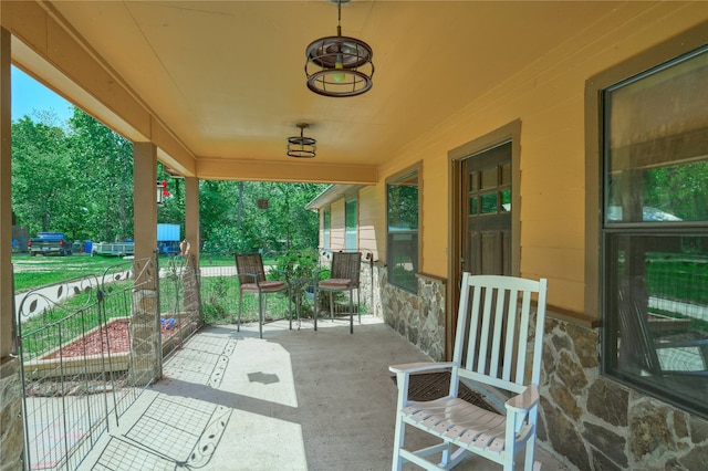 view of patio featuring a porch