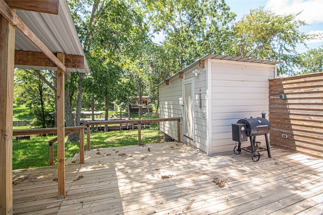 deck featuring a grill