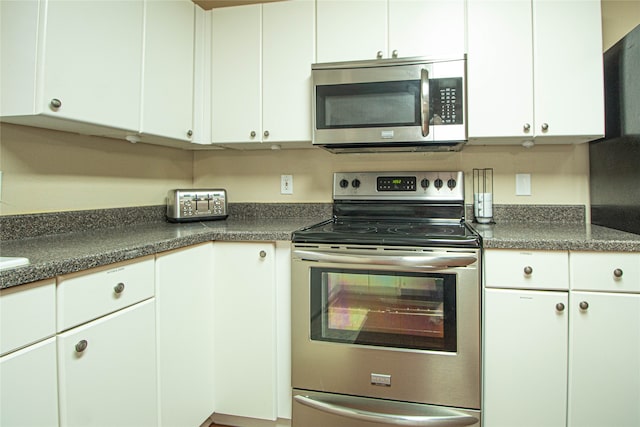 kitchen featuring white cabinets and stainless steel appliances