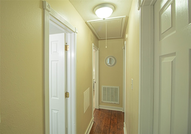 hallway with dark wood-type flooring