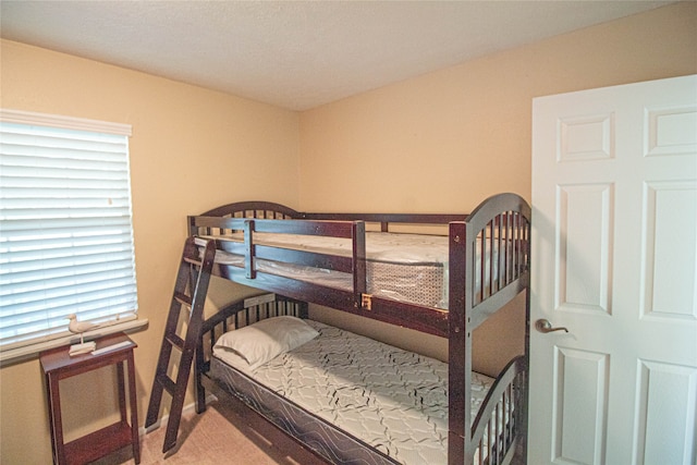 bedroom featuring multiple windows