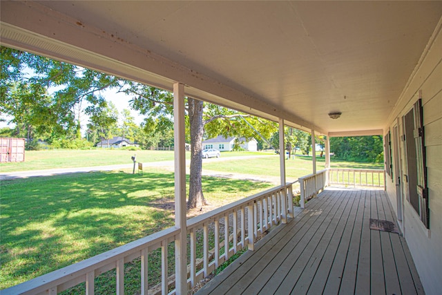 deck featuring a yard