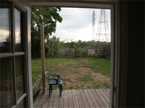 view of yard with a wooden deck