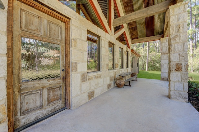 property entrance with a patio