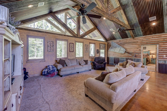 carpeted living room featuring beam ceiling, a healthy amount of sunlight, and ceiling fan