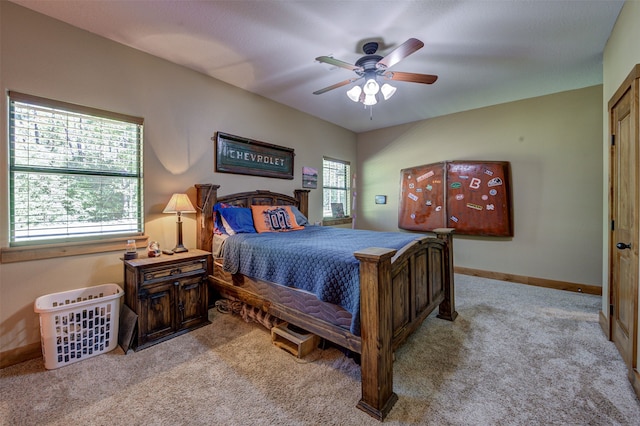 bedroom featuring light carpet and ceiling fan