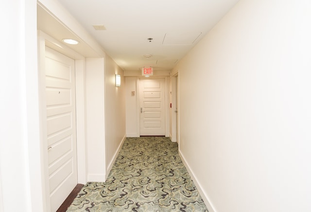 corridor with light tile flooring