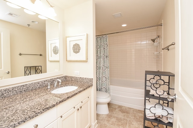 full bathroom with vanity, tile flooring, toilet, and shower / bath combination with curtain