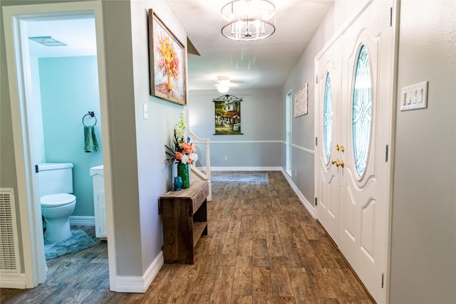 entrance foyer featuring dark wood-type flooring