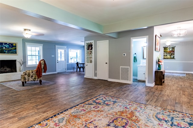 living room featuring a fireplace and hardwood / wood-style floors