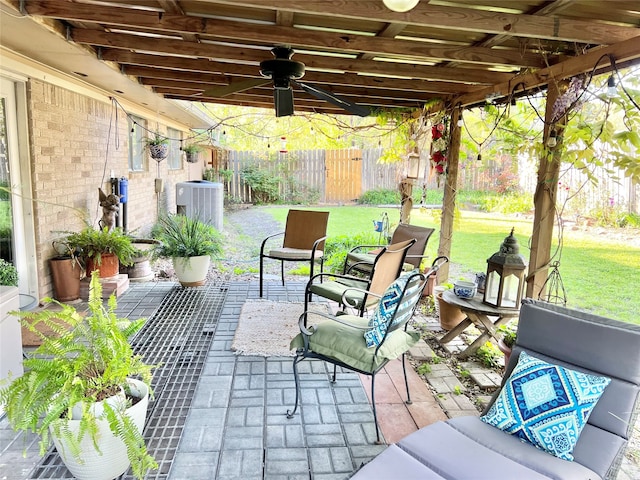 view of patio / terrace featuring central AC unit and ceiling fan