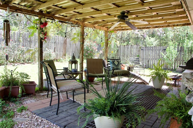 view of patio featuring ceiling fan