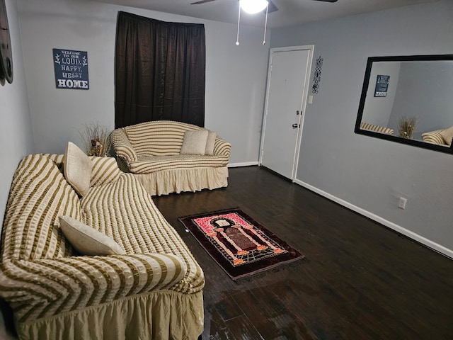 interior space featuring ceiling fan and dark hardwood / wood-style floors