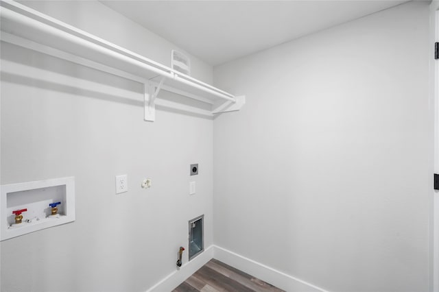 laundry room with dark hardwood / wood-style flooring, washer hookup, electric dryer hookup, and gas dryer hookup