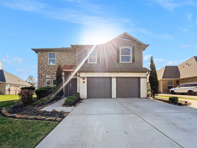 view of property with a garage and a front yard