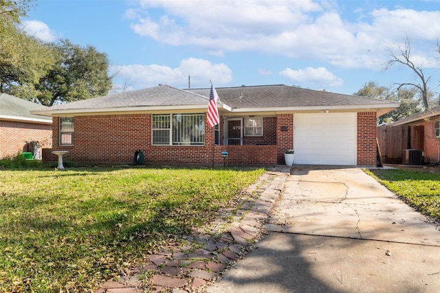 ranch-style house with a garage, central AC, and a front yard