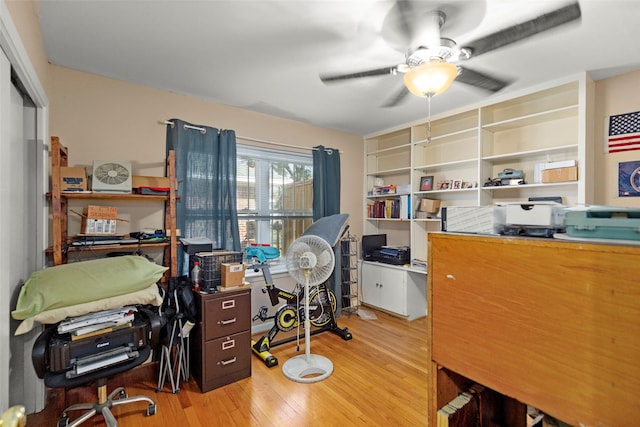 office space featuring a ceiling fan and wood finished floors