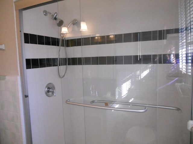 bathroom with a stall shower