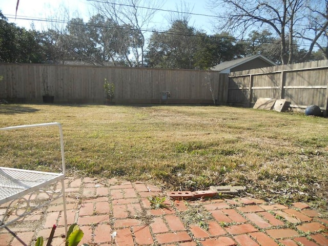 view of yard featuring a fenced backyard