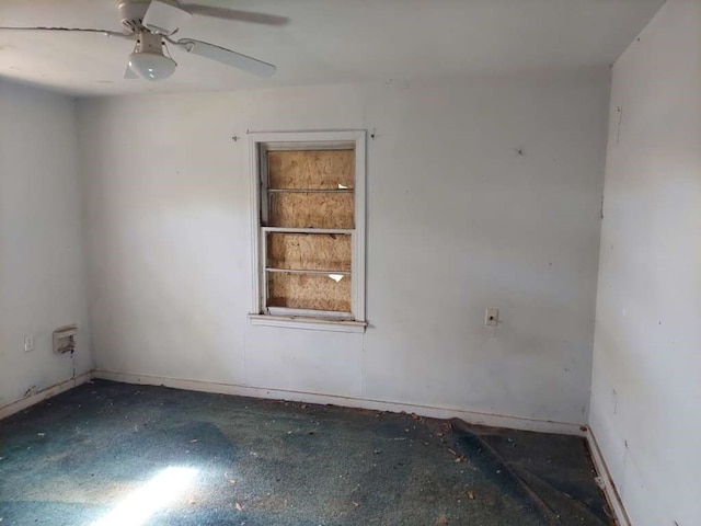 unfurnished room with ceiling fan