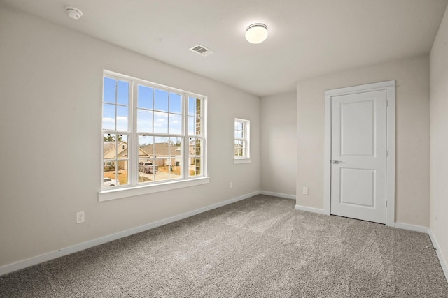 empty room with carpet floors