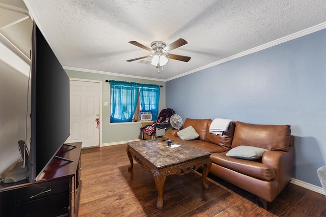 living room with ceiling fan, a textured ceiling, ornamental molding, and hardwood / wood-style floors