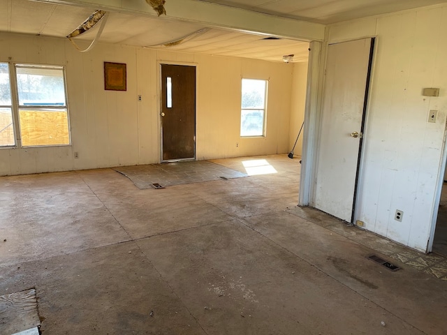 empty room featuring concrete floors