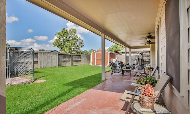 view of yard featuring ceiling fan, an outdoor hangout area, and a patio