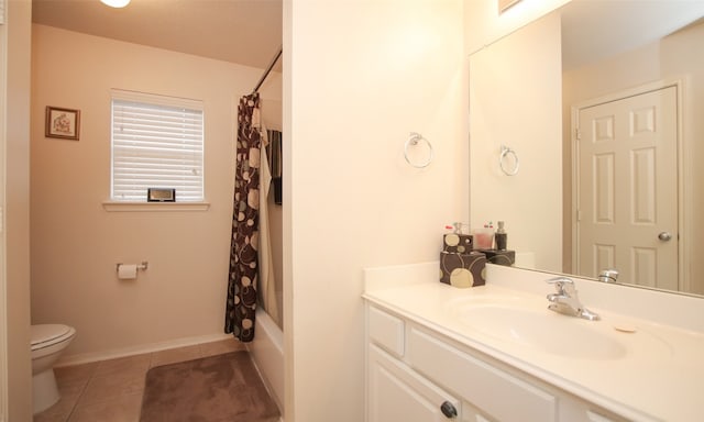 full bathroom featuring tile patterned flooring, vanity, toilet, and shower / bathtub combination with curtain