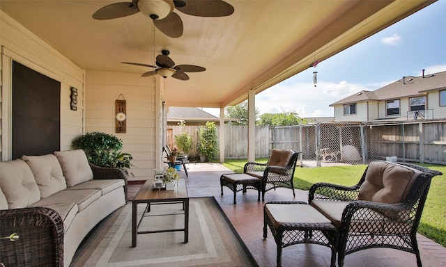 view of patio featuring an outdoor living space and ceiling fan