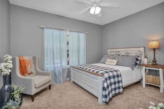 bedroom featuring ceiling fan and light colored carpet