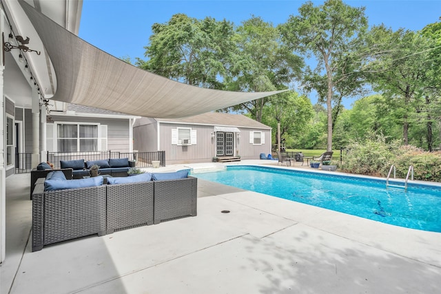 view of pool with a patio area and outdoor lounge area