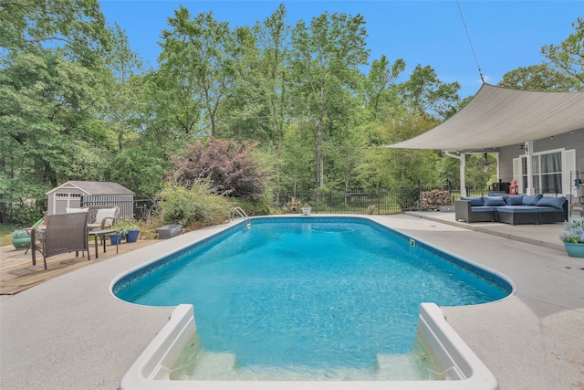 view of swimming pool with an outdoor hangout area, a patio area, and an outdoor structure