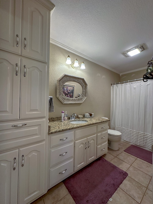 bathroom with vanity, tile flooring, a textured ceiling, and toilet