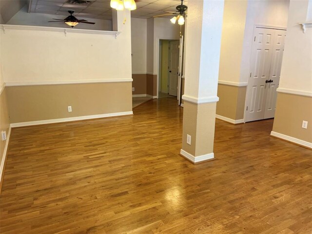 204 W Fayette St, Fayetteville, TX 78940 - empty room with ceiling fan, wood-type flooring, and a paneled ceiling