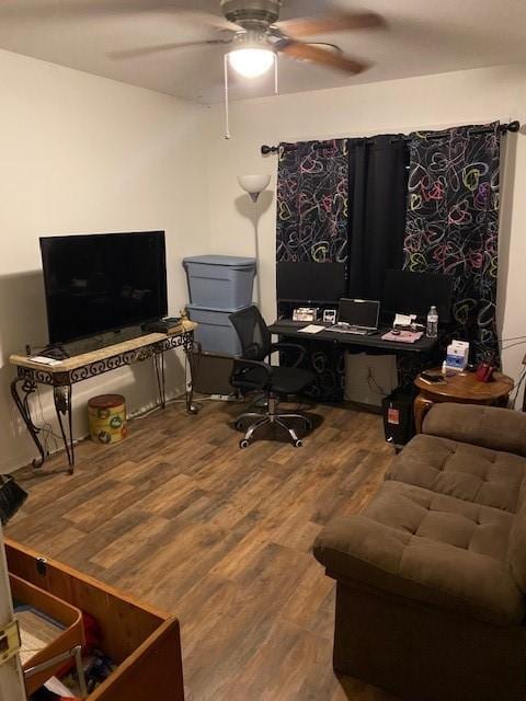 office with hardwood / wood-style floors and ceiling fan