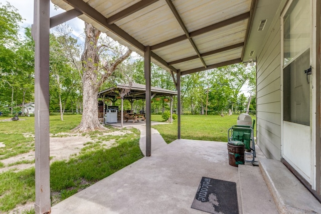 view of terrace featuring a gazebo