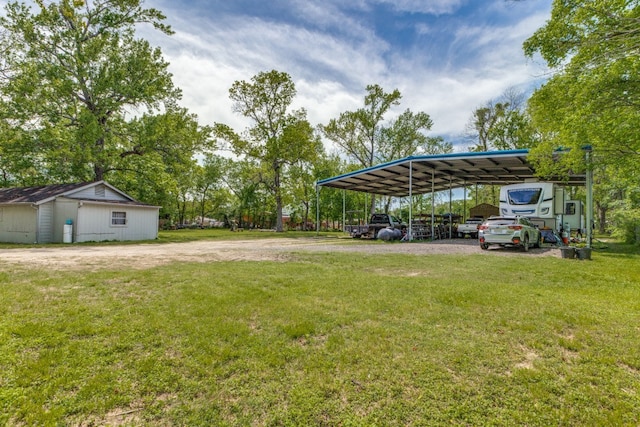 view of yard featuring a carport