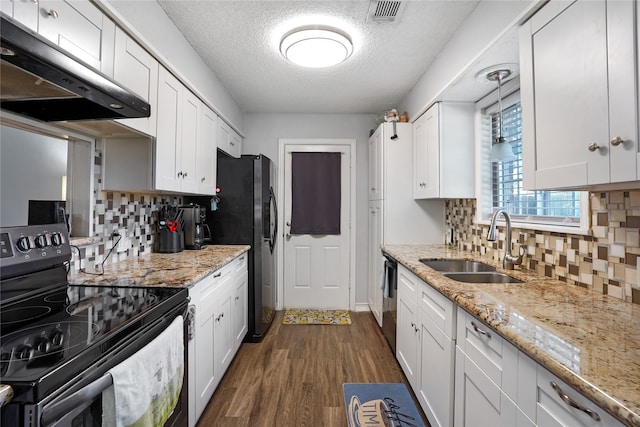 kitchen with white cabinetry, dark hardwood / wood-style floors, black range with electric cooktop, sink, and tasteful backsplash