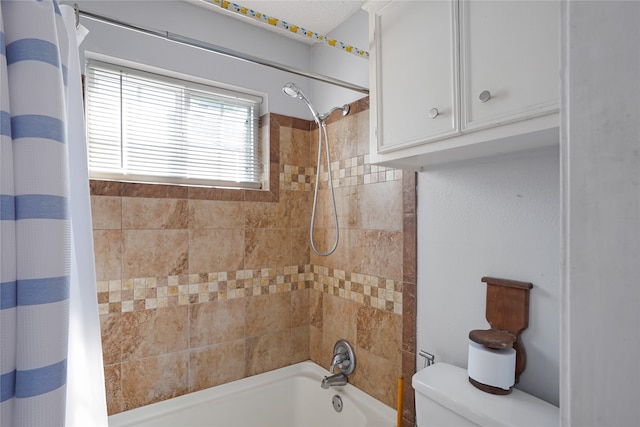 bathroom featuring toilet and shower / tub combo with curtain