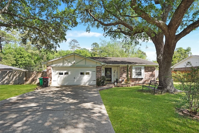 ranch-style home with a front yard and a garage