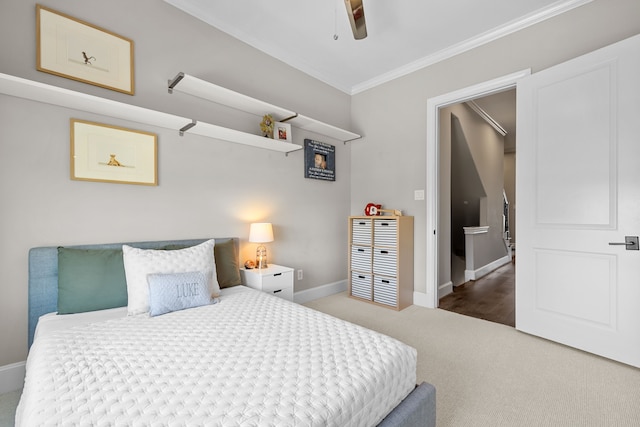 bedroom featuring ceiling fan, carpet, and ornamental molding